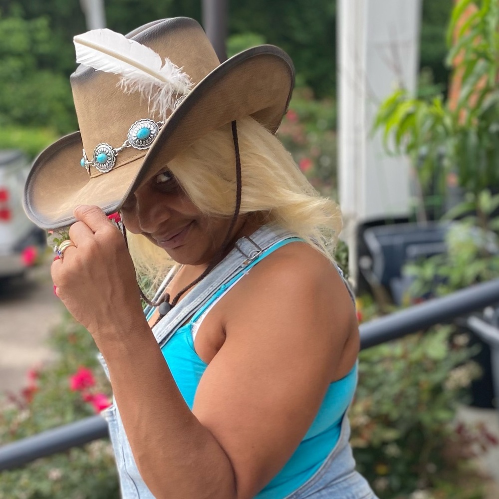 Tan Leather Cowboy Hat with a Silver and Turquoise Stone Hatband
